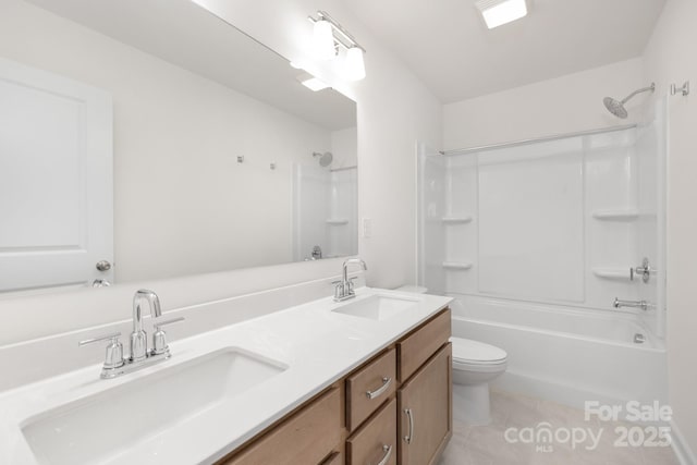 bathroom with toilet, shower / bathtub combination, tile patterned floors, and a sink