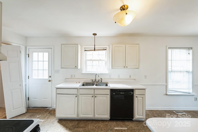 kitchen with black dishwasher, visible vents, plenty of natural light, and a sink