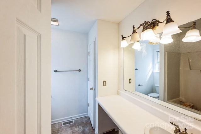 full bathroom featuring visible vents, toilet, baseboards, walk in shower, and vanity