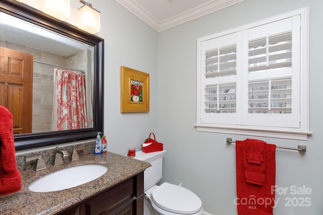 bathroom featuring vanity, toilet, crown molding, and a shower with curtain