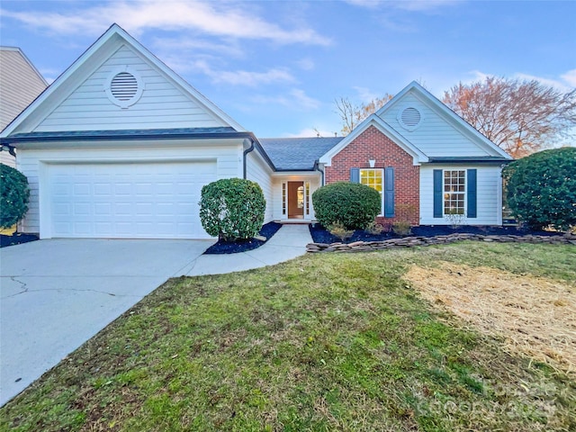 ranch-style home with brick siding, a front yard, concrete driveway, and an attached garage