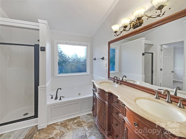 full bath featuring ornamental molding, a stall shower, a whirlpool tub, and a sink