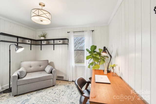 office area with visible vents and ornamental molding