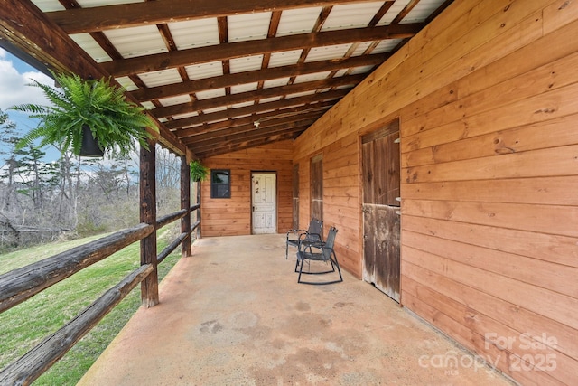 view of patio featuring an outdoor structure and an exterior structure