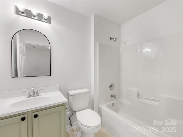 full bath with vanity, shower / tub combination, and toilet