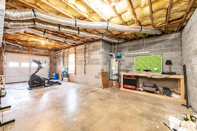 garage with concrete block wall and water heater