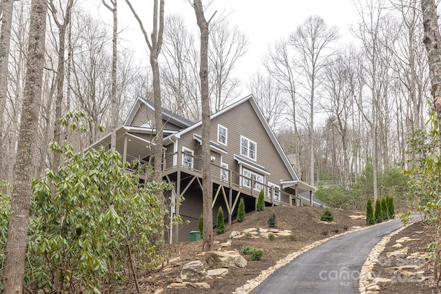 view of home's exterior featuring a deck