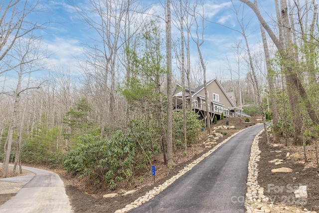 view of road featuring a view of trees