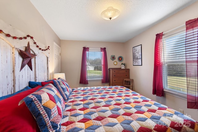 bedroom featuring a textured ceiling