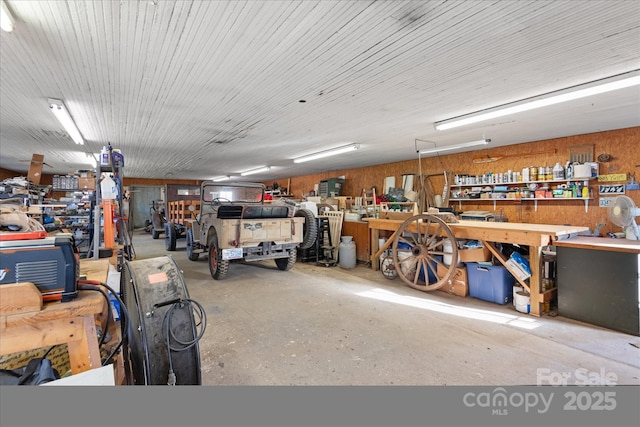 garage with a workshop area