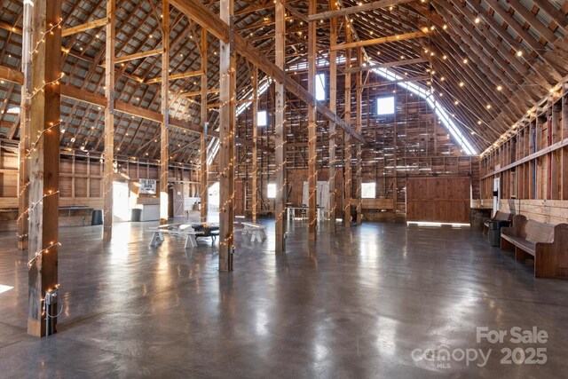 misc room featuring high vaulted ceiling