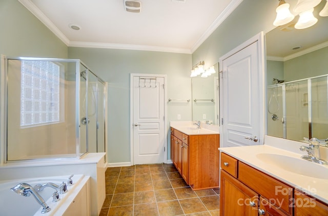 bathroom featuring two vanities, a stall shower, crown molding, and a sink