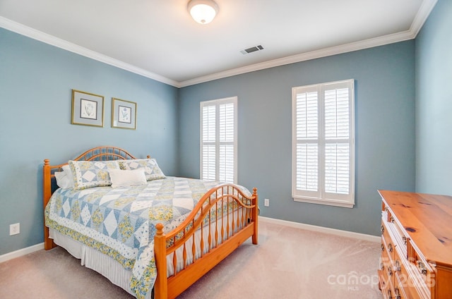 bedroom featuring visible vents, multiple windows, baseboards, and carpet floors