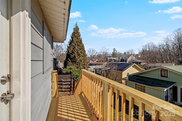 balcony featuring a residential view