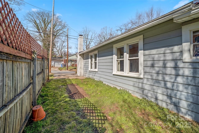 view of yard featuring fence