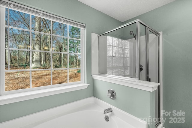 8421 Kings Creek Dr, Charlotte, NC 28273 - full bath with a shower stall, a garden tub, and a textured ceiling