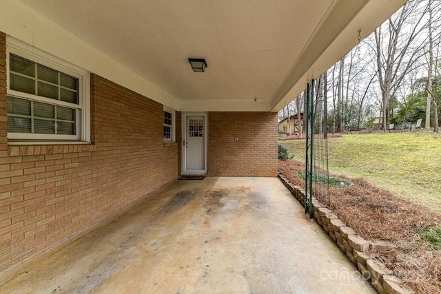 view of patio / terrace featuring an attached carport