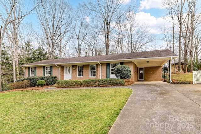 ranch-style home with an attached carport, brick siding, a front lawn, and driveway