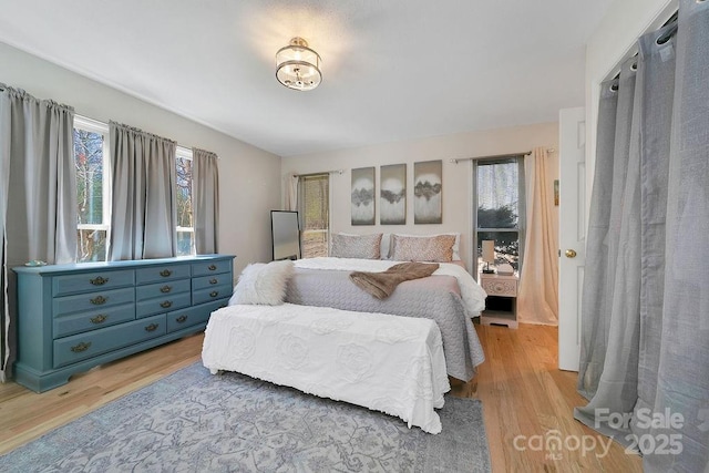 bedroom with light wood-style floors