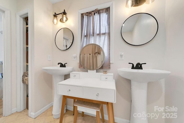 bathroom featuring baseboards