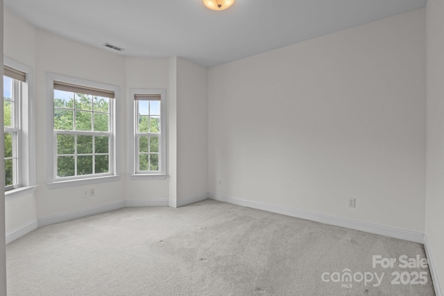 561 Keystone Ct NW, Concord, NC 28027 - empty room featuring carpet flooring and baseboards