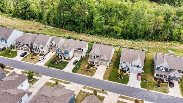 bird's eye view with a residential view and a forest view