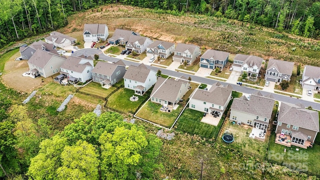 aerial view with a residential view and a forest view