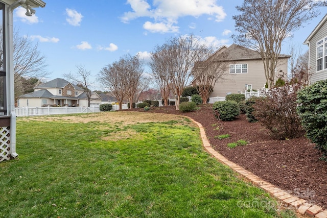 view of yard with fence