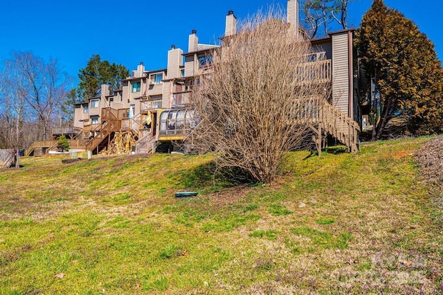 view of property featuring stairway