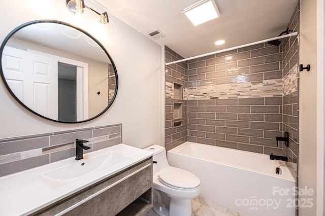 bathroom featuring visible vents, toilet, marble finish floor,  shower combination, and vanity