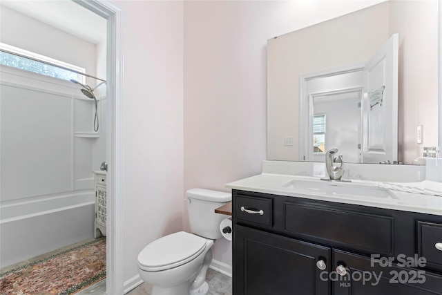 bathroom featuring vanity, shower / bathing tub combination, toilet, and baseboards