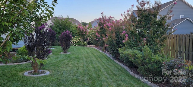 view of yard featuring fence