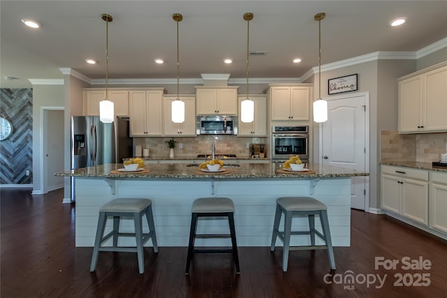 246 Sweet Briar Dr, Fort Mill, SC 29707 - kitchen with stone counters, dark wood-type flooring, appliances with stainless steel finishes, and a kitchen island with sink