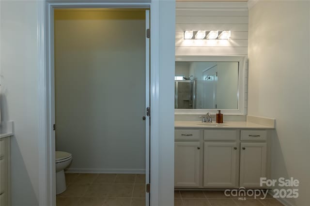 246 Sweet Briar Dr, Fort Mill, SC 29707 - bathroom with baseboards, toilet, vanity, and tile patterned flooring