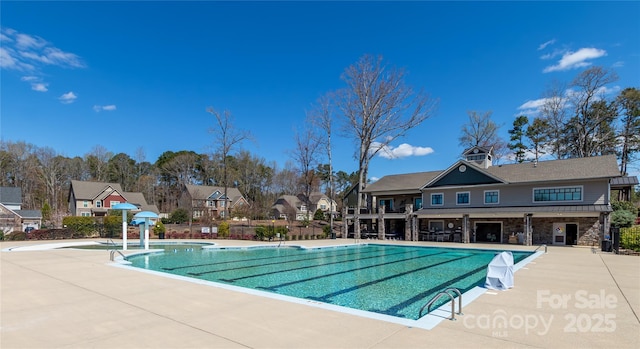 246 Sweet Briar Dr, Fort Mill, SC 29707 - community pool featuring fence, a patio area, and a residential view