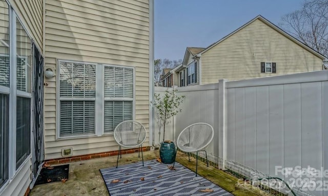 view of patio / terrace with fence