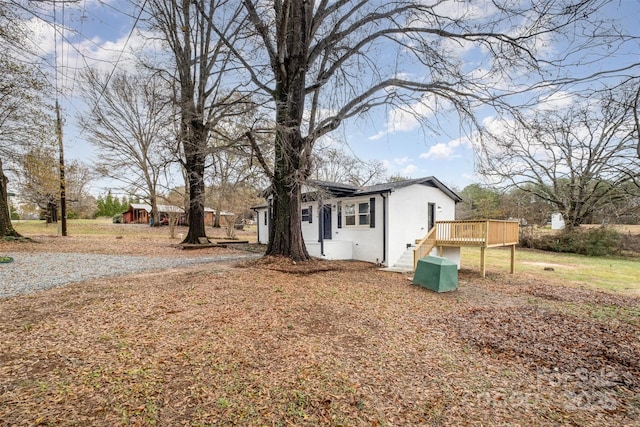 exterior space with a wooden deck