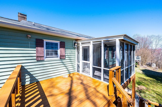 deck featuring a sunroom