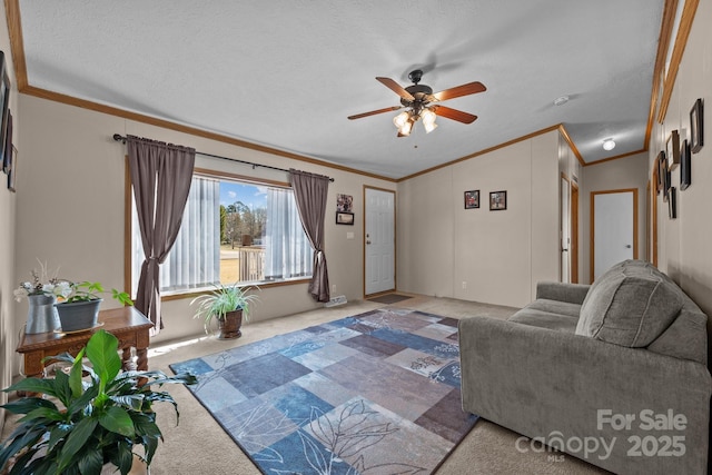 living room featuring a textured ceiling, carpet, crown molding, ceiling fan, and vaulted ceiling