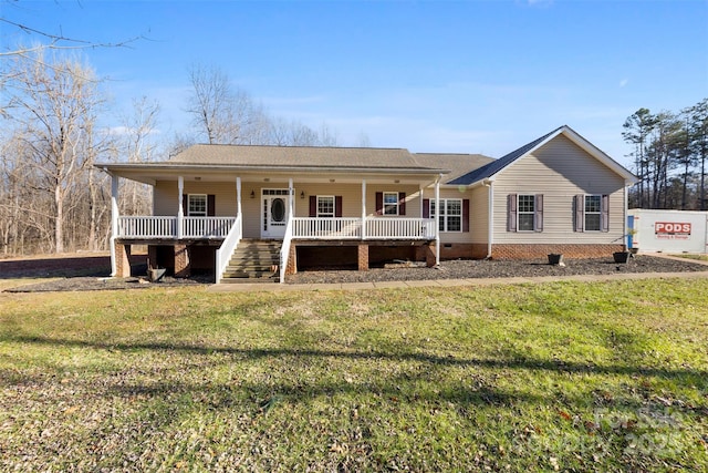 back of property featuring crawl space, a yard, roof with shingles, and covered porch