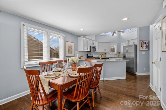 dining room featuring recessed lighting, baseboards, and dark wood-type flooring