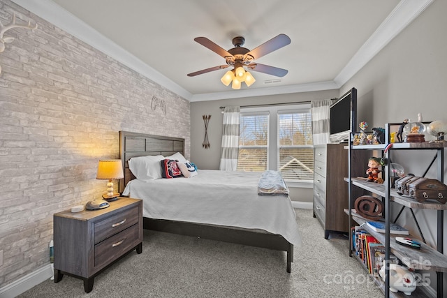 bedroom with carpet flooring, baseboards, brick wall, and crown molding