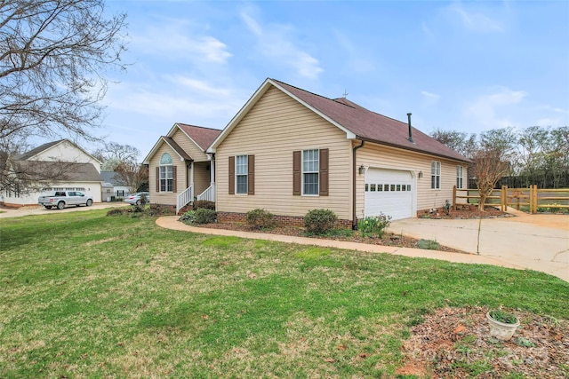 ranch-style home with a front yard, fence, a shingled roof, concrete driveway, and a garage