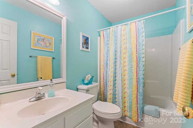 bathroom with shower / tub combo, toilet, vanity, and a textured ceiling