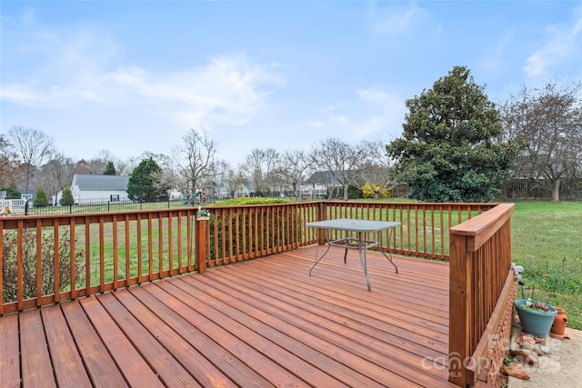 deck featuring a yard and fence private yard