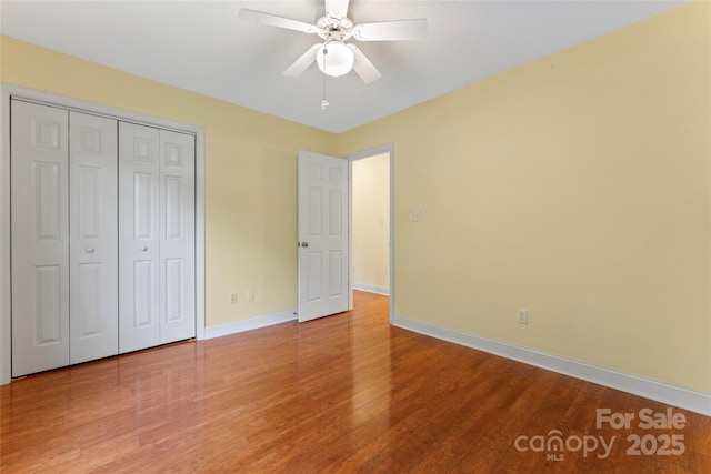 1278 Gracebrook Dr, Salisbury, NC 28147 - unfurnished bedroom with wood finished floors, a closet, and a ceiling fan