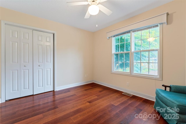 1278 Gracebrook Dr, Salisbury, NC 28147 - unfurnished bedroom with dark wood-style flooring, a closet, and ceiling fan
