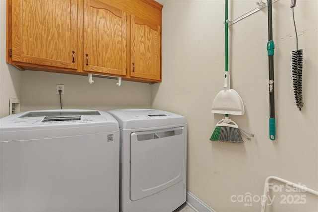 1278 Gracebrook Dr, Salisbury, NC 28147 - laundry room featuring cabinet space and washer and dryer