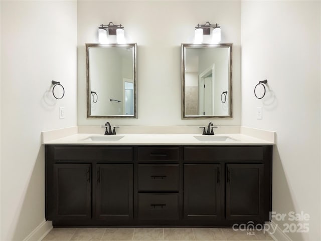 bathroom featuring double vanity and a sink