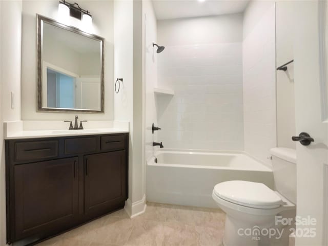 bathroom with toilet, vanity, and shower / tub combination